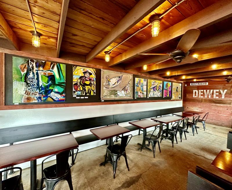 A selection of Allread’s work hangs at Dewey Beer Company in Dewey Beach. A dining customer once Venmoed Allread a $10 tip to show their appreciation for the table-side exhibit. SUBMITTED PHOTO